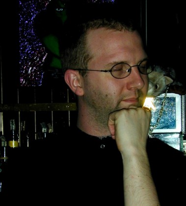 kit with eyes closed