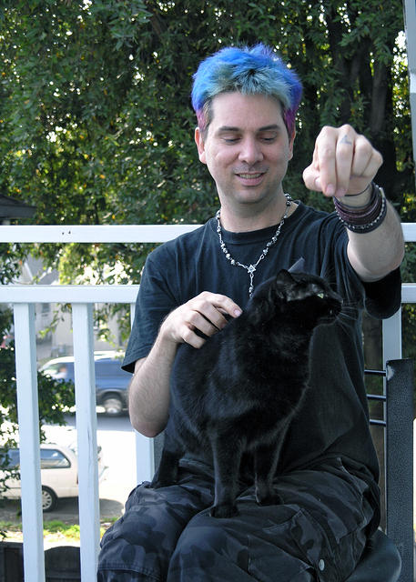 Peter playing with Laura's cat