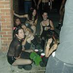 squatting on the sidewalk